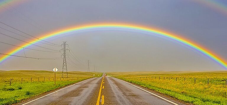 Rainbow over a road