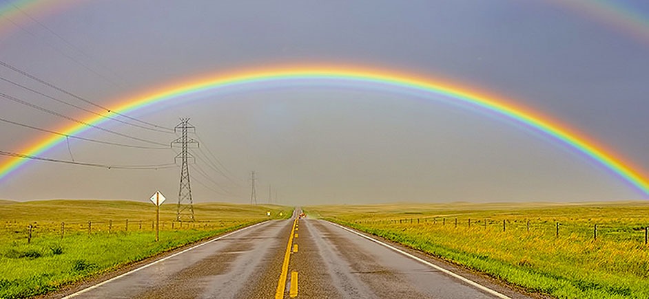 Rainbow over a road