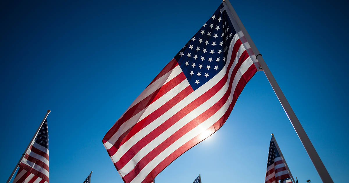 American flag against blue sky